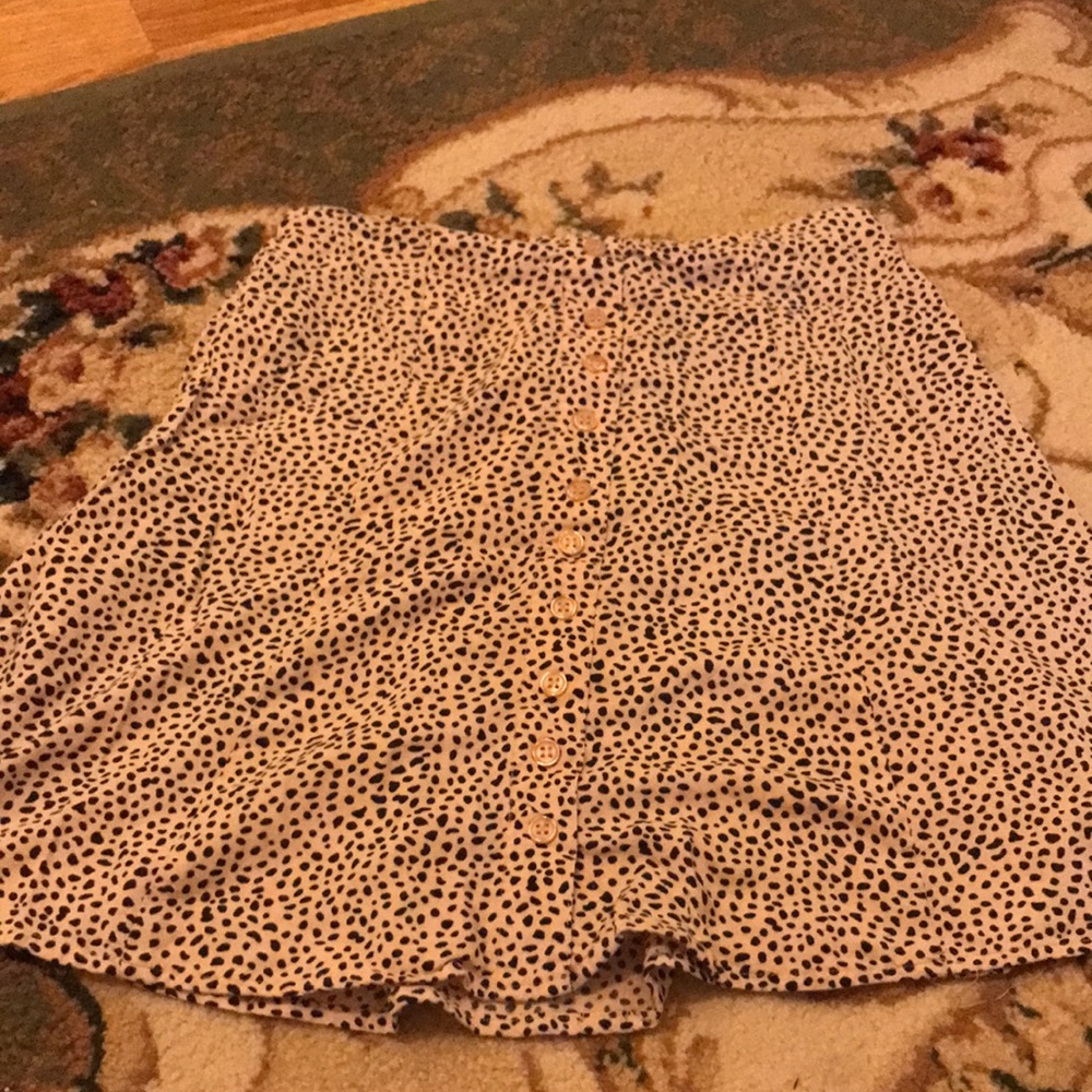 Pink skirt with animal print with buttons in the center, size M
